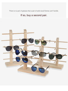 Stylish wood stand holding sunglasses