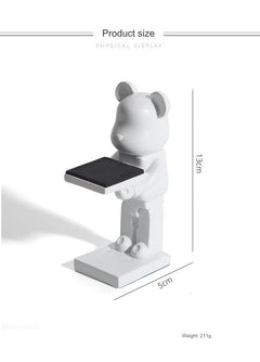 Astronaut resin stand with Apple Watch displayed