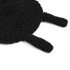 Showcasing soft yarn crochet baby clothing