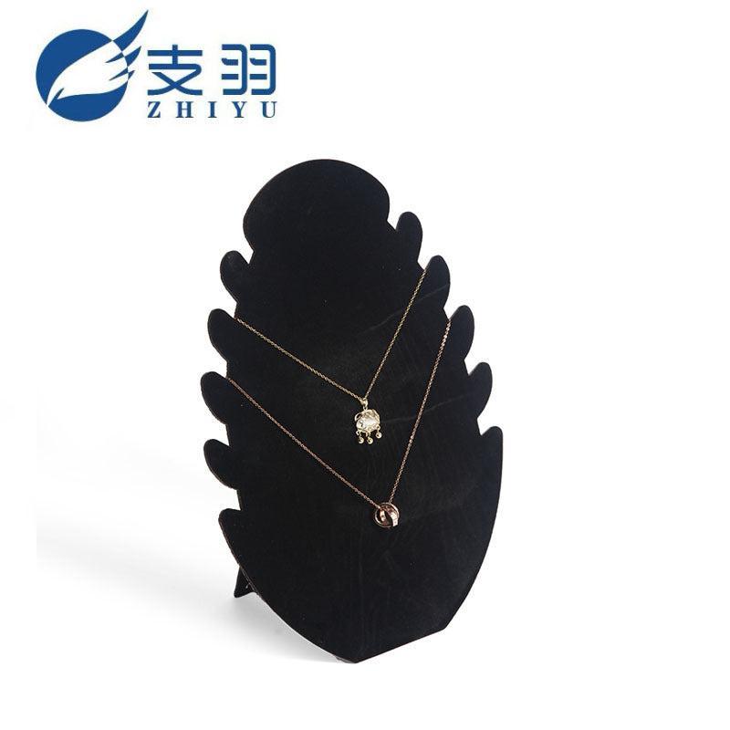 three-tiered velvet jewelry organizer