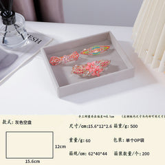 Beige velvet-lined jewelry storage for bracelets