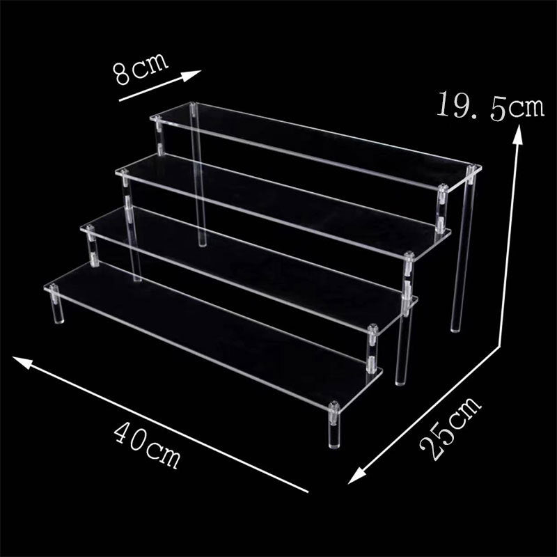 Empty multi-tiered acrylic display stand in retail store