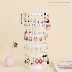 Sleek black and white rotating earring holder