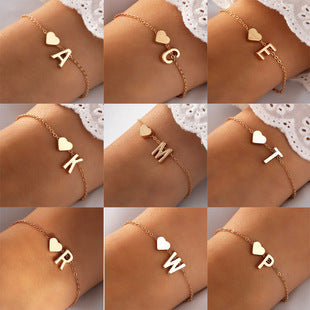 Gold heart-shaped bracelet on display
