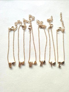Gold heart-shaped bracelet on display