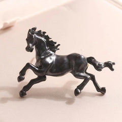 Three colour options of horse brooch