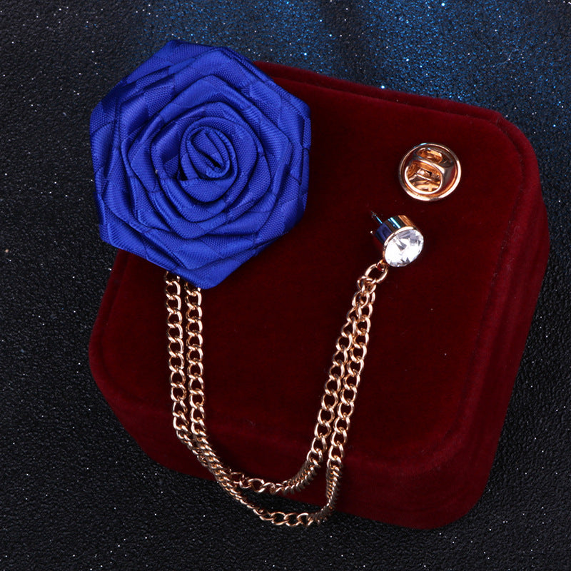 Rhinestone brooch alongside other fashion accessories