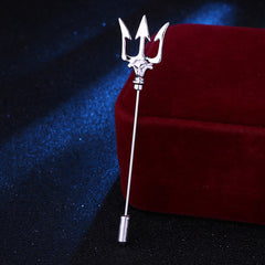 Detailed view of trident design on lapel pin