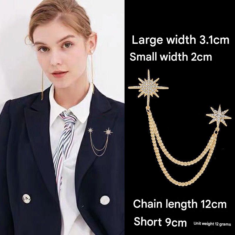 Close-up of star pattern brooch for men and women