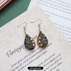 Artistic vintage earrings in mixed materials