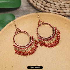 Women wearing handmade bohemian earrings outdoors