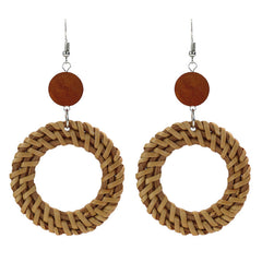 Unique woven earrings on a model