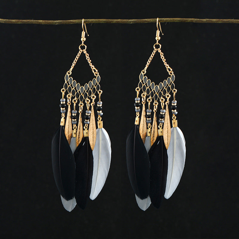 Elegant blue bohemian earrings in outdoor setting