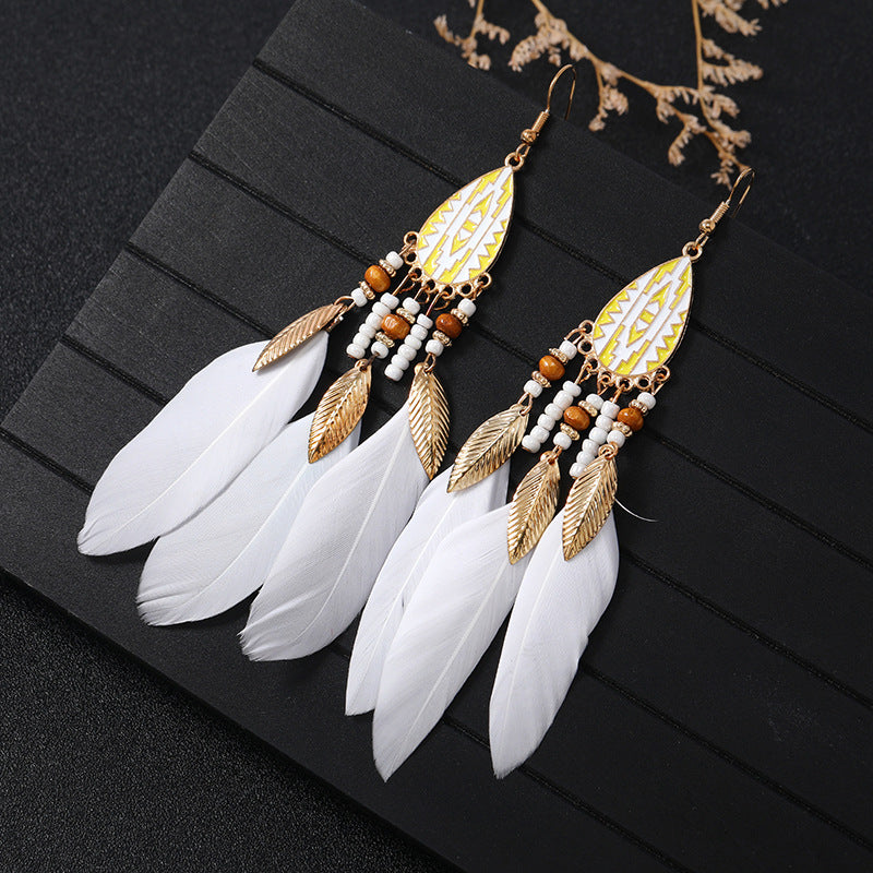 Elegant blue bohemian earrings in outdoor setting