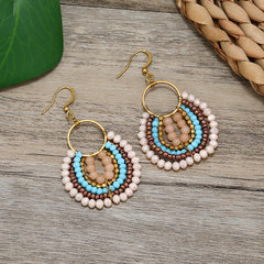 Colorful display of tassel earrings