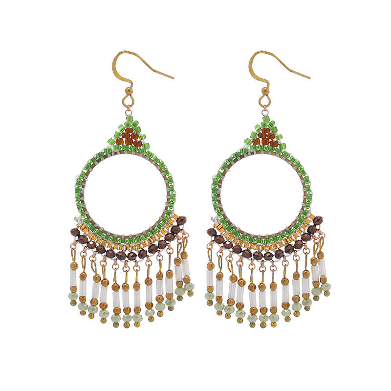 Worn tassel earrings in casual setting