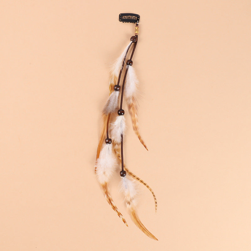 Hair clip showcasing vibrant feather patterns