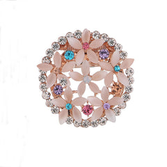 Floral rhinestone brooch on fabric