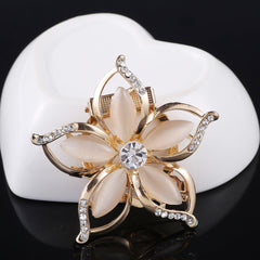 Brooch securing a scarf elegantly