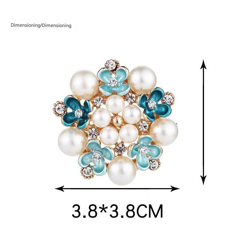 Detailed view of pearl embellishments on brooch