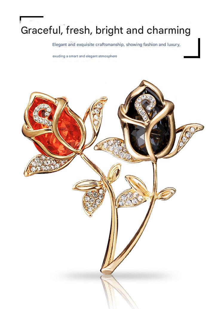 Stylish red rose brooch on a black background