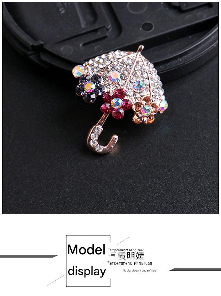 Rhinestone brooch on a scarf display