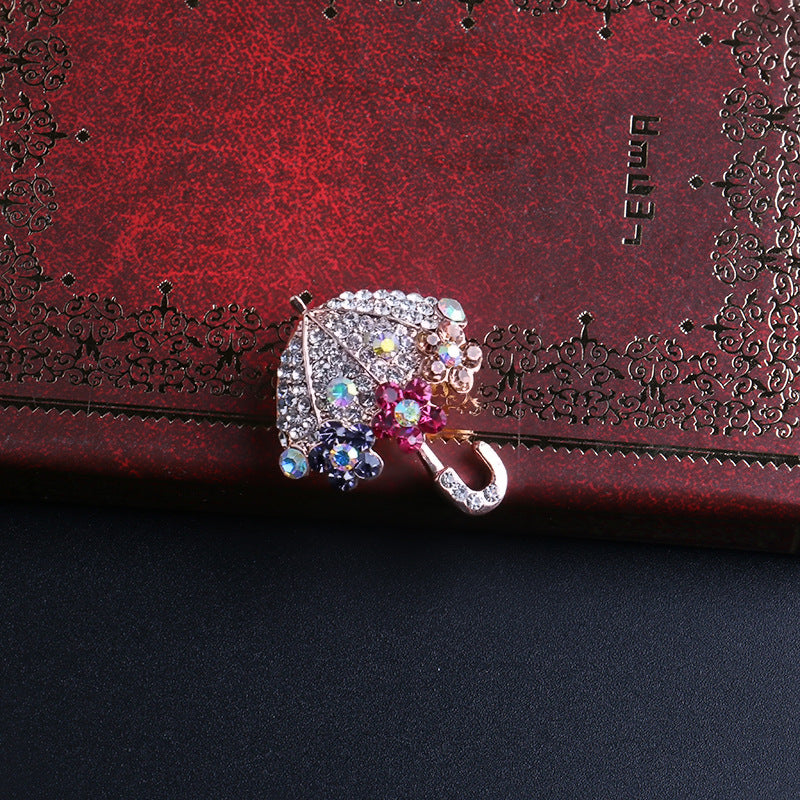 Rhinestone Umbrella Brooch taken outdoors
