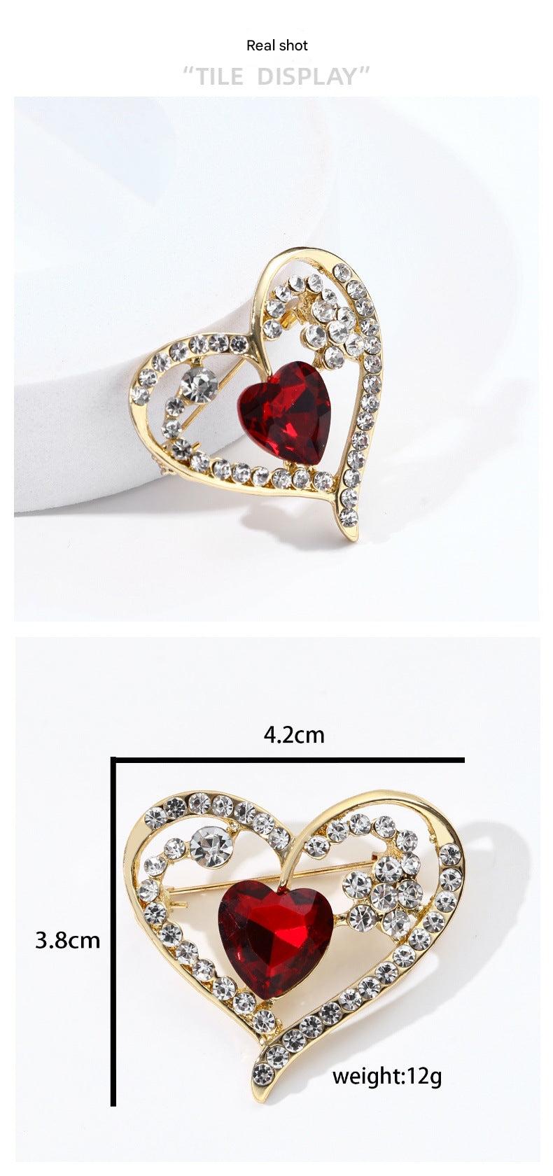 beautiful red brooch on fabric