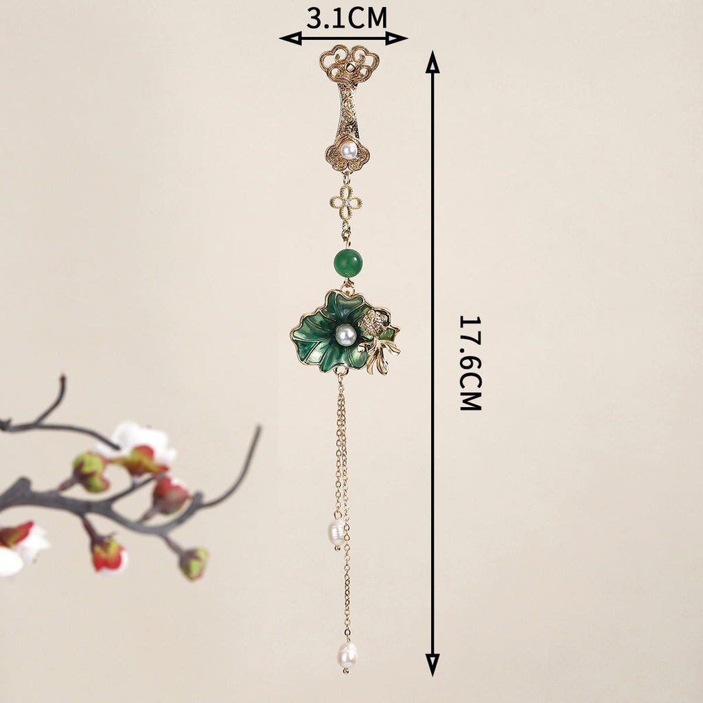 beautiful brooch accessory on fabric background