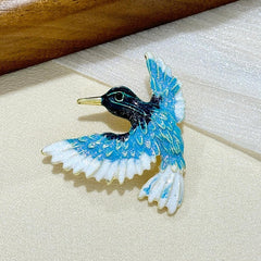 Vintage-inspired brooch resting on a table