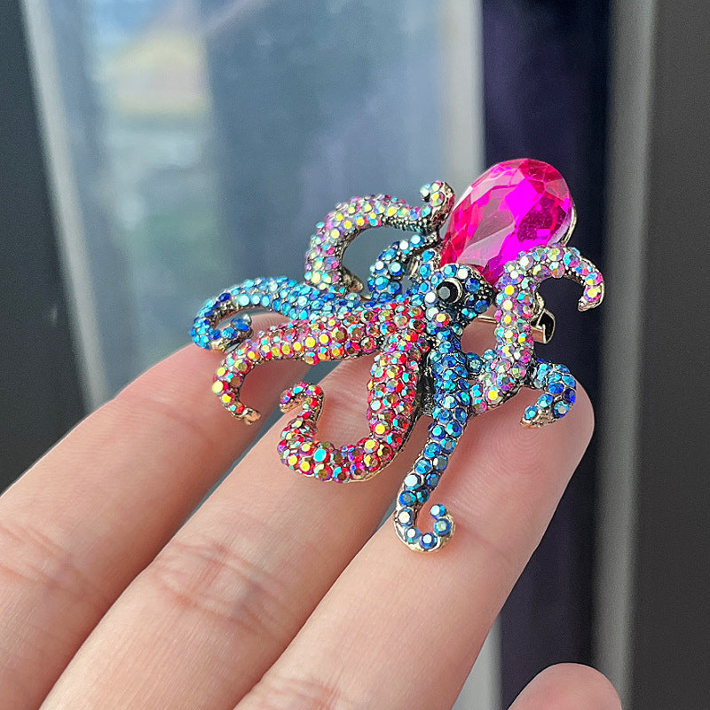 Octopus Brooch with rhinestones on fabric