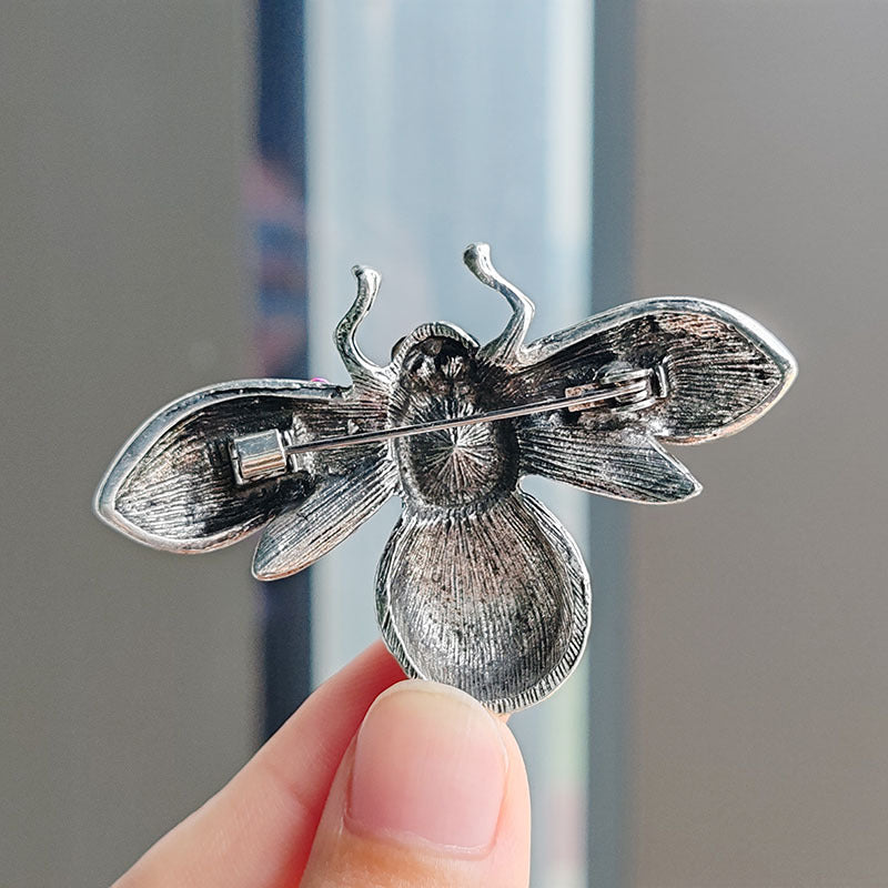 Bee brooch styled for fashionable look