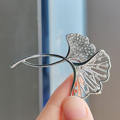 Elegant brooch showcased on black jacket image 6