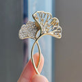 Elegant brooch showcased on black jacket image 6