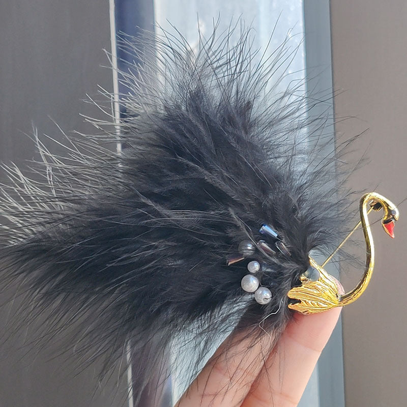 Unique swan brooch showcasing classic design