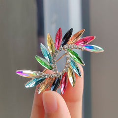 Close-up of crystal floral brooch