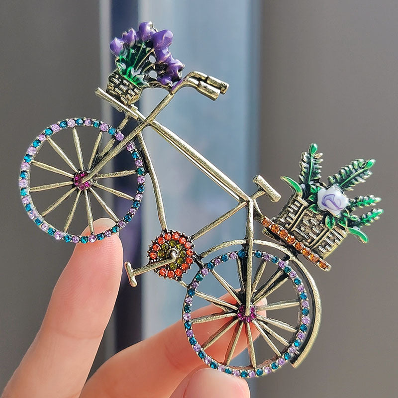 Close-up of rhinestone bicycle brooch pin