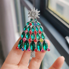 Close-up of vibrant green brooch with rhinestones