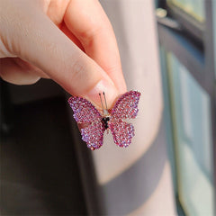 Butterfly brooch worn on a cardigan