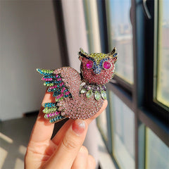 feminine fashion with owl-inspired accessory