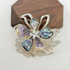 Elegant rhinestone bowknot brooch on coat