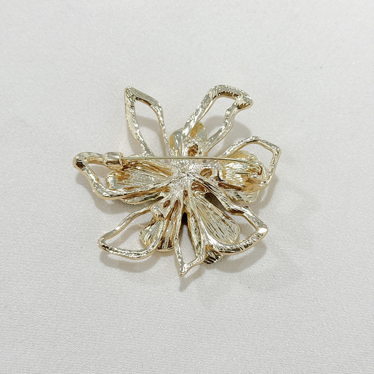 Close-up of rhinestone detail on brooch