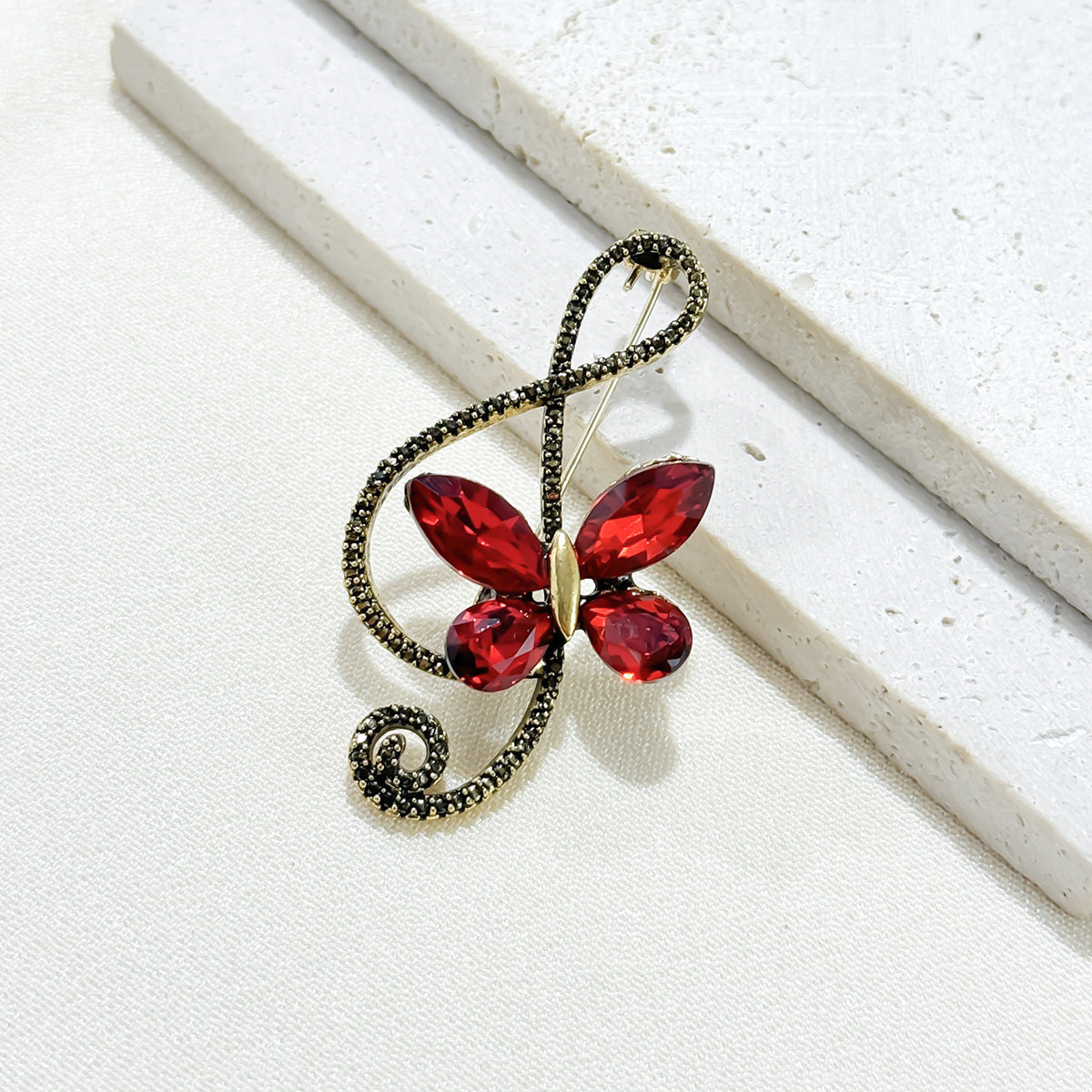Full view of butterfly crystal note brooch