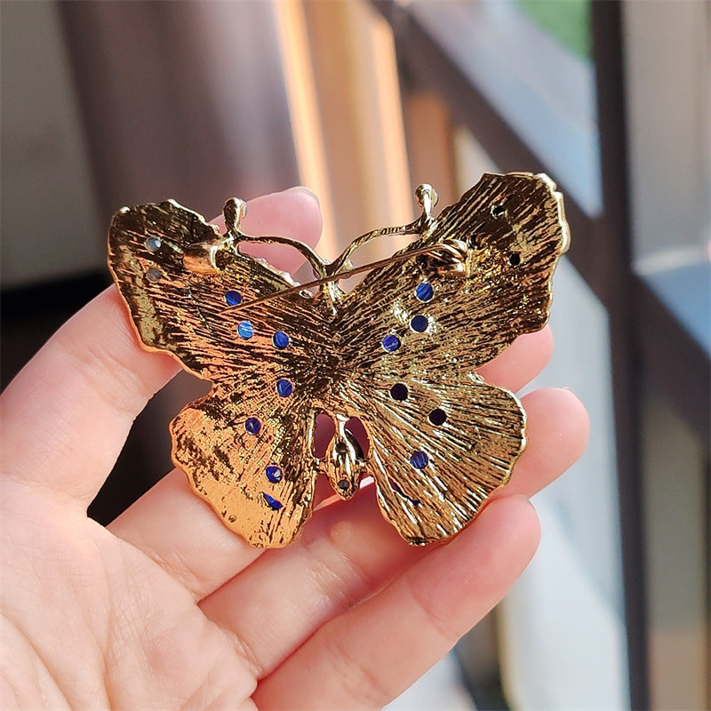 Elegant butterfly brooch on a coat