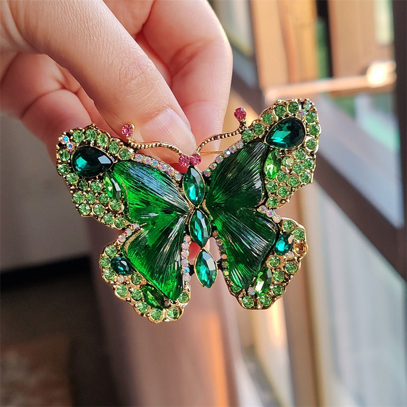 Stylish butterfly brooch displayed on fabric