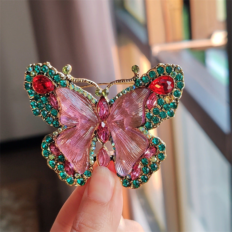 Stylish butterfly brooch displayed on fabric