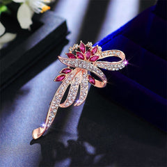 Vintage floral brooch in purple gemstone accents