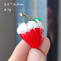 Durable Strawberry Enamel Pin showcased