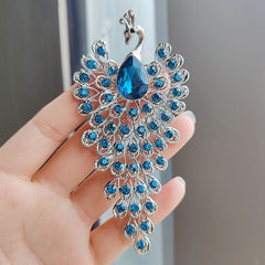 Sparkling rhinestone peacock brooch pin close-up