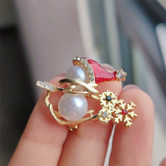 Snowman brooch displayed in a festive setting